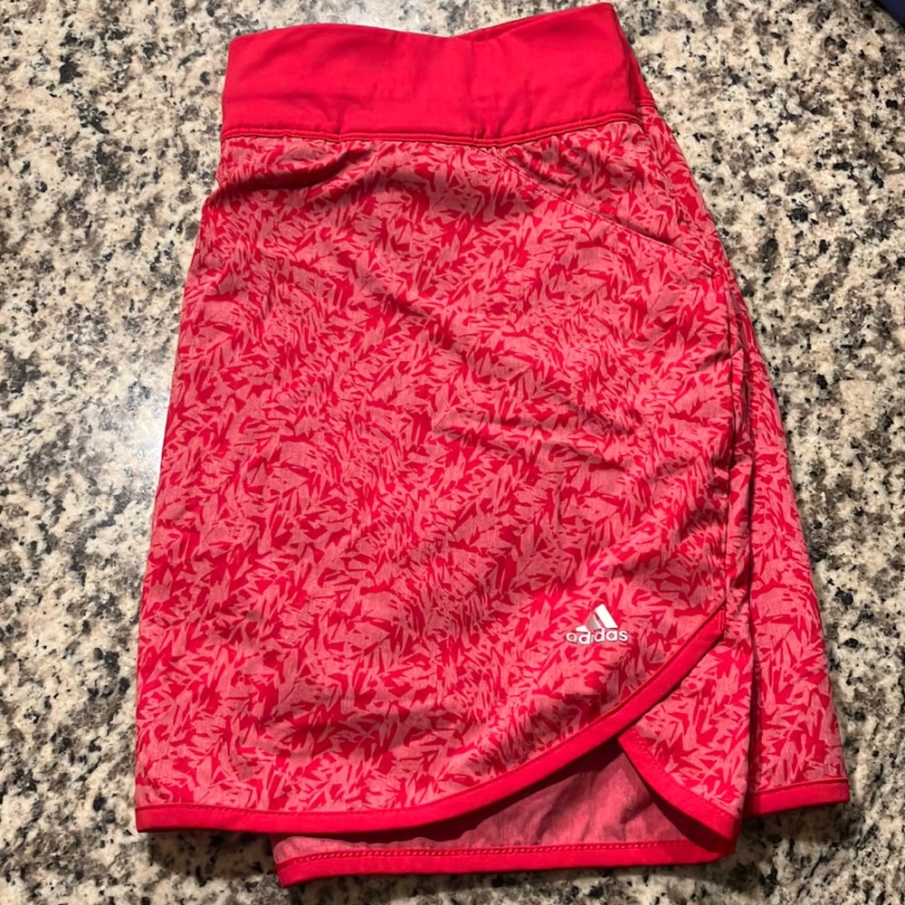 Adidas golf, red/salmon/pink color w/ fun pattern, medium, like new condition